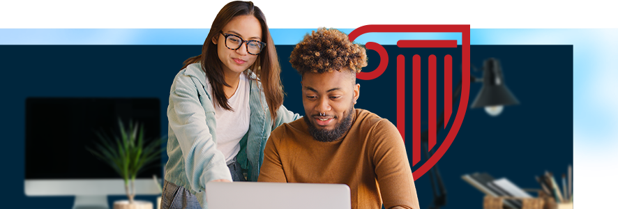 Students looking at computer
